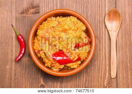 Couscous with vegetables on wood from above