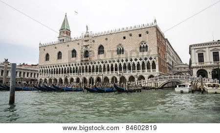 Gondolas Parking Near Doges Palace In Summer Venice