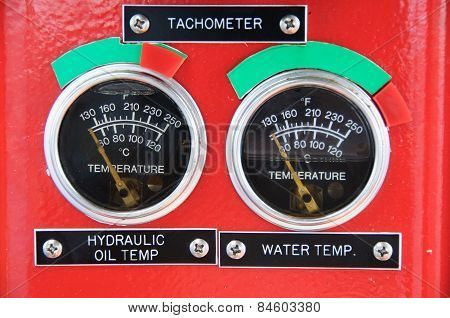 Meters or gauge in crane cabin for measure Maximun load, Engine speed , Hydraulic pressure