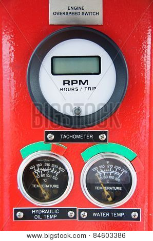 Meters or gauge in crane cabin for measure Maximun load, Engine speed , Hydraulic pressure