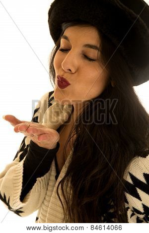 Beautiful Dark Complected Female Model Blowing A Kiss