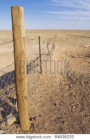 Dingoe fence in the Australian Outback.
