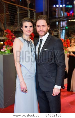 BERLIN, GERMANY - FEBRUARY 14: Daniel Bruehl and his girlfriend Felicitas Rombold attend the Closing Ceremony of the 65th Berlinale International Film Festival on February 14, 2015 in Berlin, Germany
