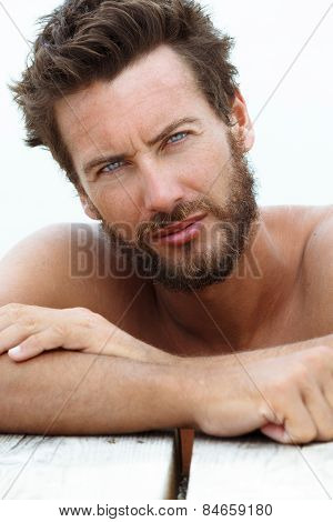 Portrait Of Confident Seductive Handsome Man
