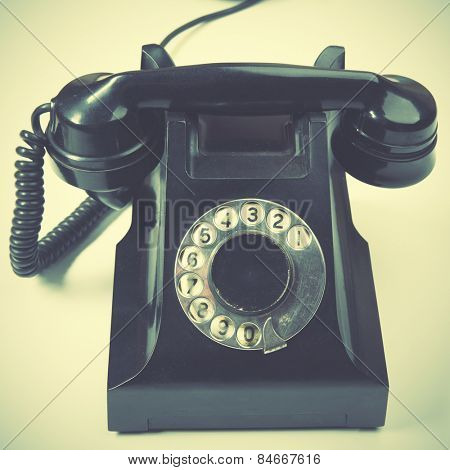 Vintage telephone. Retro style filtred image