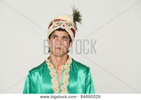 Young indian male in dhoti dress, isolated on white background