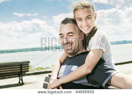 Father with his daughter at sea getting good time