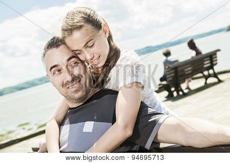 Father with his daughter at sea getting good time