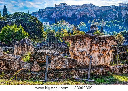 View on Acropolis from ancient agora, Athens, Greece. Beautiful landscape photography at dawn with ruins of classical greek architecture.