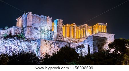 Parthenon and Herodium construction in Acropolis Hill in Athens, Greece shot in blue hour with