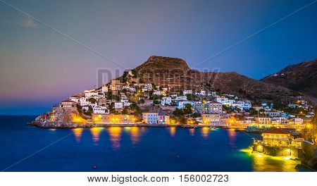 Hydra island on a summer night in Greece. Beautiful landscape with night illumination.