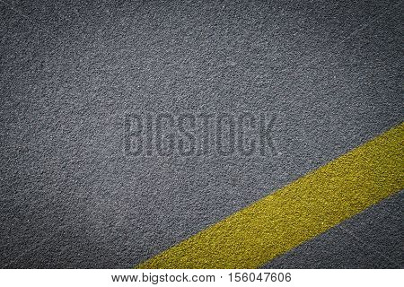 Asphalt road texture yellow line on road