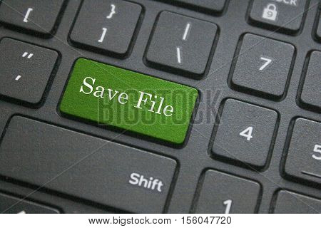 Save file button on black computer keyboard