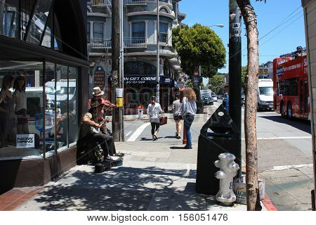 San Francisco, USA - 11 June 2010. Buskers on the streets of San Francisco. Street musicians playing for passersby for money