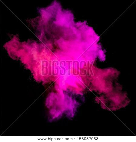 Freeze motion of purle dust explosion isolated on black background