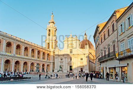 LORETO ITALY - OCTOBER 6 2012: The tourists and pilgrims in Square of Madonna with the view on the Basilica of Santa Casa on October 6 in Loreto.