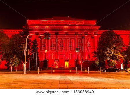 KIEV UKRAINE - SEPTEMBER 11 2016: The red building of National University of Taras Shevchenko boasts bright illumination making it the most colorful in city on September 11 in Kiev.