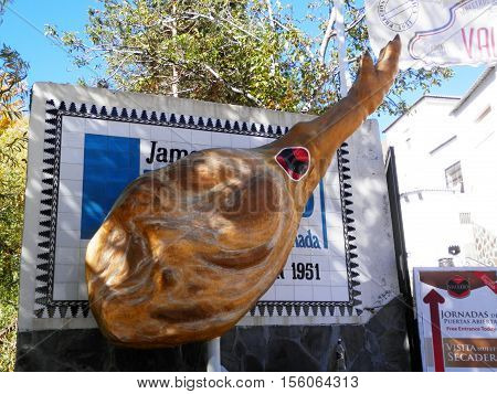 Trevelez Spain - October 31 2016: Large Spanish Ham advertising a wellknown Salting and Drying Business