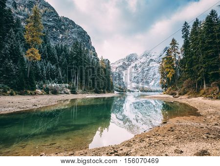 Great scene the alpine lake Braies (Pragser Wildsee). Popular tourist attraction. Location place Dolomiti, national park Fanes-Sennes-Braies, Italy. Europe. Instagram toning effect. Beauty world.