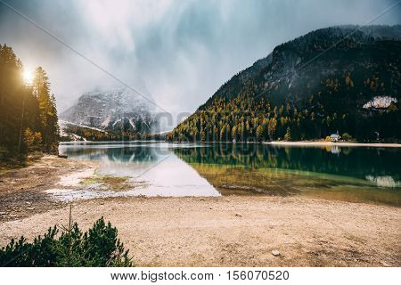 Great scene the alpine lake Braies (Pragser Wildsee). Popular tourist attraction. Location place Dolomiti, national park Fanes-Sennes-Braies, Italy. Europe. Instagram toning effect. Beauty world.