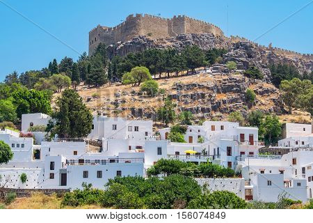 View of Lindos town and Acropolis. Rhodes Dodecanese islands Greece Europe