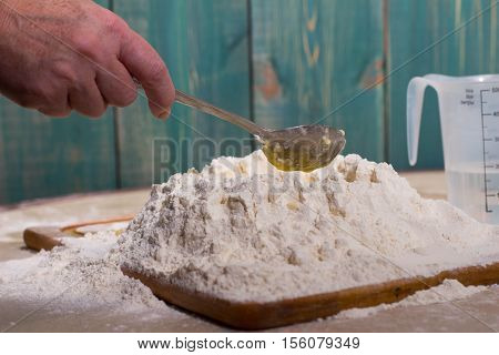 Woman knead dough. Bake. Woman baking cookies raviolly and pizza