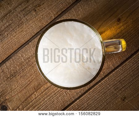 glass of beer. top view. background or texture