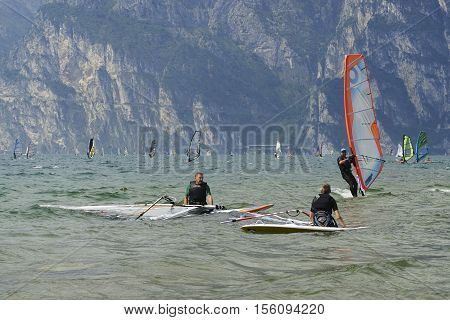 Torbole - Nago, Lago di Garda (Lago Benaco), Italy - August 11, 2015: A windsurfing on Lake Garda in Torbole resort.