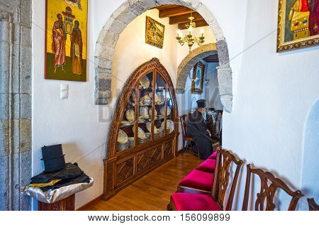 Patmos Greece - May 16 2010: A priest in the Agios Joannis Theologos Monastry