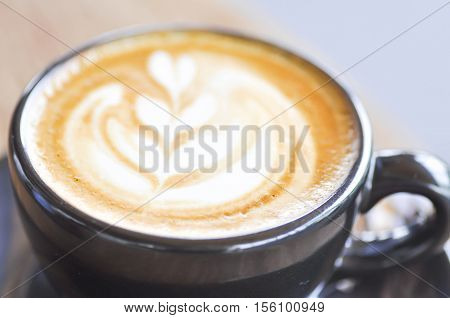 hot cappuccino or hot coffee on the table