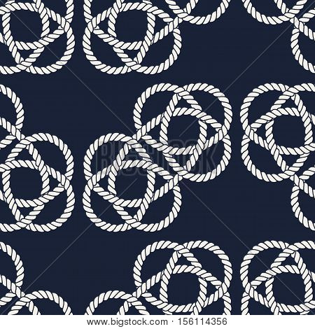 Seamless nautical rope pattern. Endless navy illustration with white loop ornament. Marine Carrick Bend knots on dark blue backdrop. Trendy maritime style background. For fabric, wallpaper, wrapping