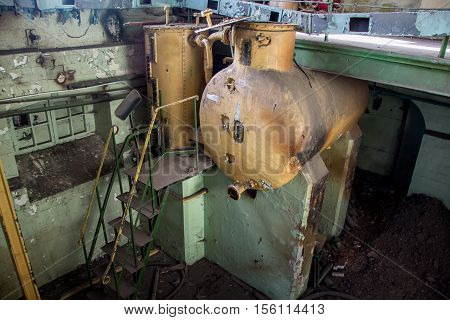 Old equipment tank alcoholmeters in an abandoned Voronezh Distillery