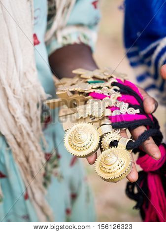Crosses and other symbols sold as souvenirs by local children close to Axum Ethiopia.