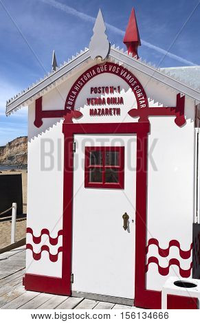 NAZARE, PORTUGAL - September 12, 2016: View of a stall selling sour cherry liquor called ginjinha on the streets of Nazare Portugal
Translation: A beautiful story to be told. Nazareth Liquor Stall.