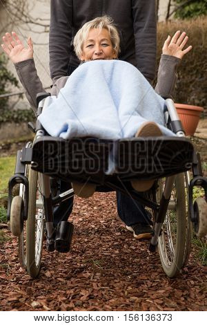 Senior Adult Woman In Wheelchair