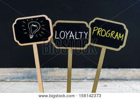 Concept Message Loyalty Program And Light Bulb As Symbol For Idea