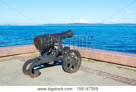 Ancient cannon created at the Alexander factory. Located on the waterfront of Lake Onega in Petrozavodsk. It weaved power and history, courage and fear.