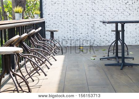 Old wooden outdoor chair on the floor stock photo