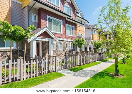 Row of townhouses on a sunny day