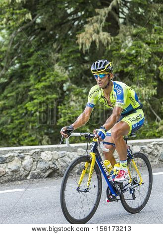 Col du Tourmalet France - July 24 2014: The Italian cyclist Daniele Bennati of Tinkoff-Saxo Team climbing the difficult road to Col du Tourmalet in Pyrenees Mountains during the stage 18 of Le Tour de France 2014.