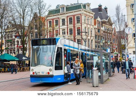 Amsterdam, Netherlands - March 31, 2016: Tram 2 running in city centre of Amsterdam, Holland