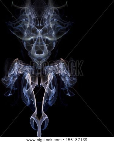 An image of smoke in the shape of a demon.