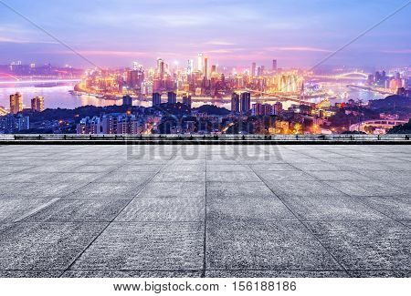 empty marble floor with cityscape and skyline in cloud sky