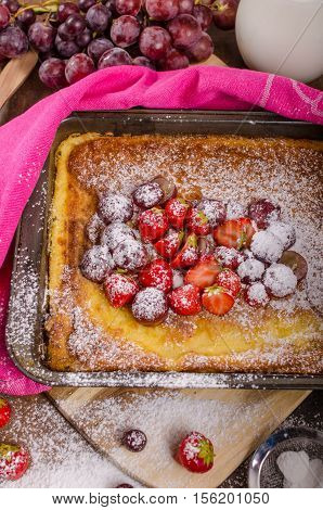 Pancake Cooking In A Plate With Fruit