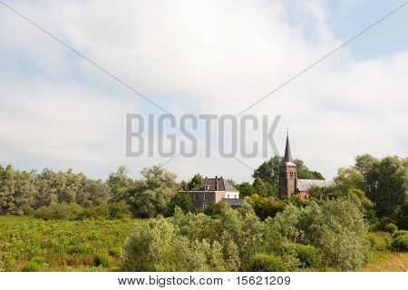 Paesaggio olandese con la Chiesa all'orizzonte