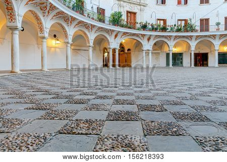 Cabildo Square Plaza del Cabildo traditional patio area in the center of Seville. Spain. Andalusia.
