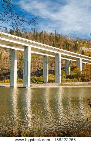Highway bridge over the Bajer Lake in Fuzine, Gorski kotar, Croatia