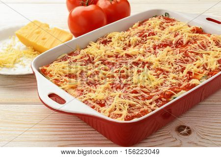 Lasagna with spinach, ricotta and feta. Cooking process.