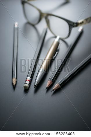 Group Of Pencils On Blackboard Focus At Pencil Eraser, Concept Sign For Misconduct Of Management Mis