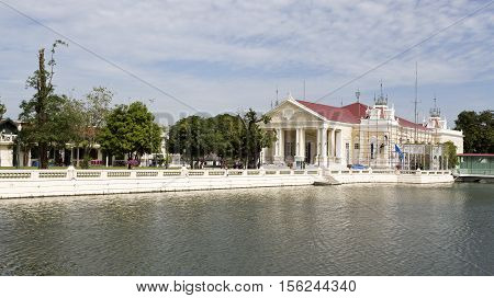AYUTTHAYA, THAILAND - November 4, 2016: View of the Phra Thinang Warophat Phiman the neoclassic royal mansion at the Bang Pa-in Palace compound Thailand